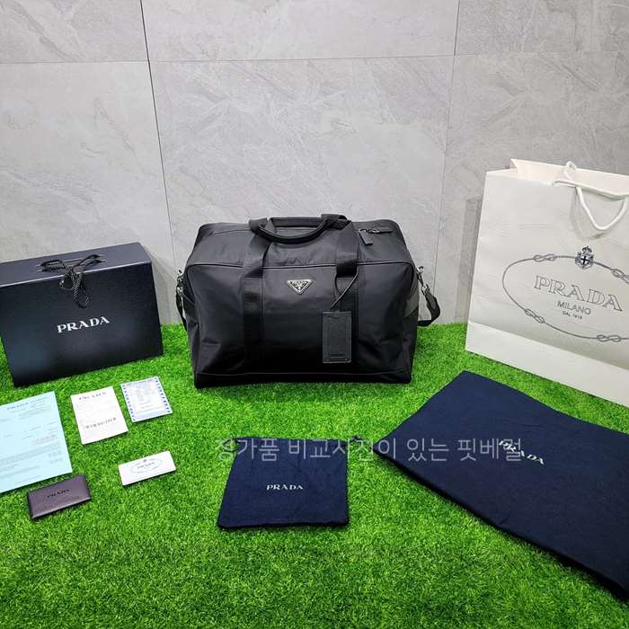 [국내배송] 프*다 테수토 삼각로고 트래블 보스턴백